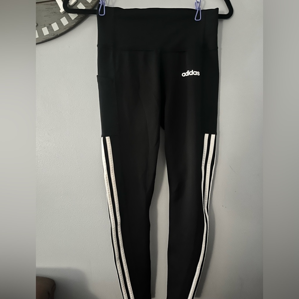 - Adidas black skinny sweatpants with white stripes size medium
